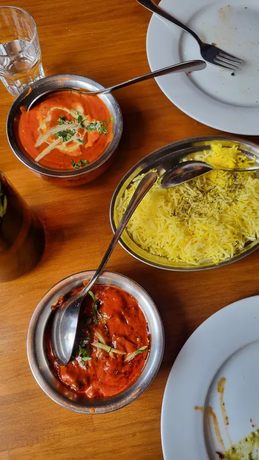 Butter chicken and rice served at Curry Culture Indian Kitchen & Bar