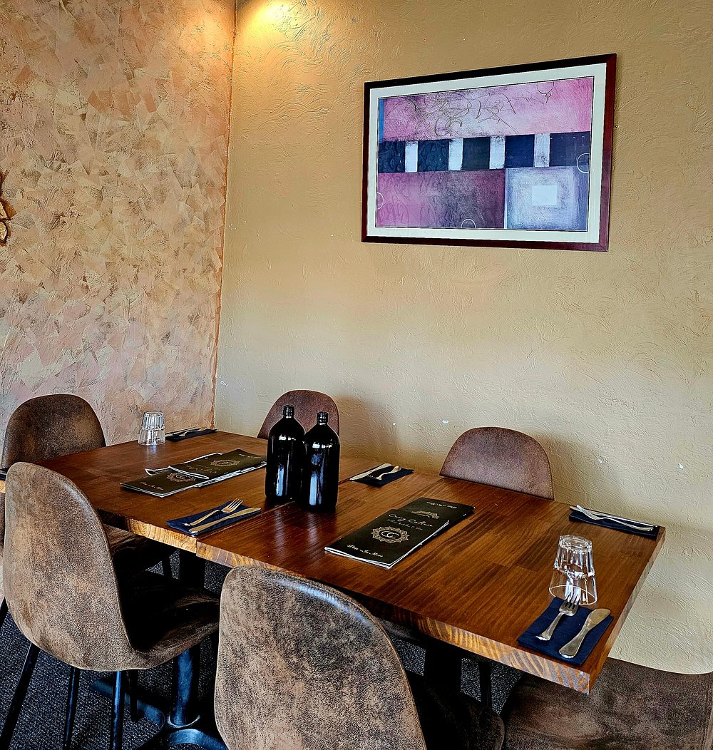 Dining room table with artwork