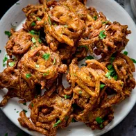 Onion bhaji, crispy marinated onion fritters