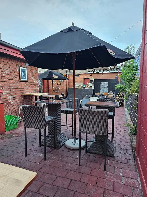 Outdoor courtyard seating at Curry Culture Indian Kitchen & Bar